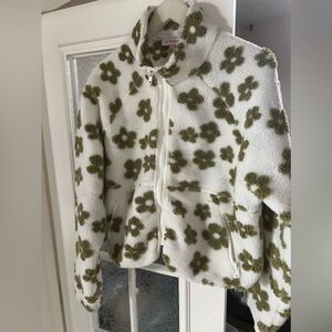 Funky fleece cropped jacket with funky retro floral pattern.